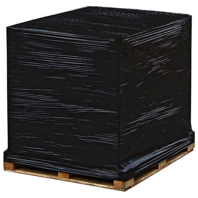 A black pallet wrap stretch film tightly envelops a large rectangular object, securely placed on a wooden pallet. The meticulous wrapping ensures safe packaging for shipping or storage, all set against a plain white background.