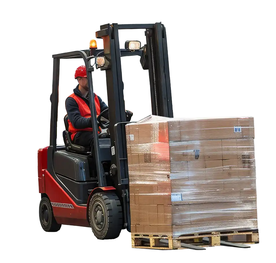 A person operating a red forklift is moving a large, wrapped pallet, embodying the precision of manufacturing. Wearing a red hard hat and reflective vest for protection, they focus intently on the task against a plain white backdrop.